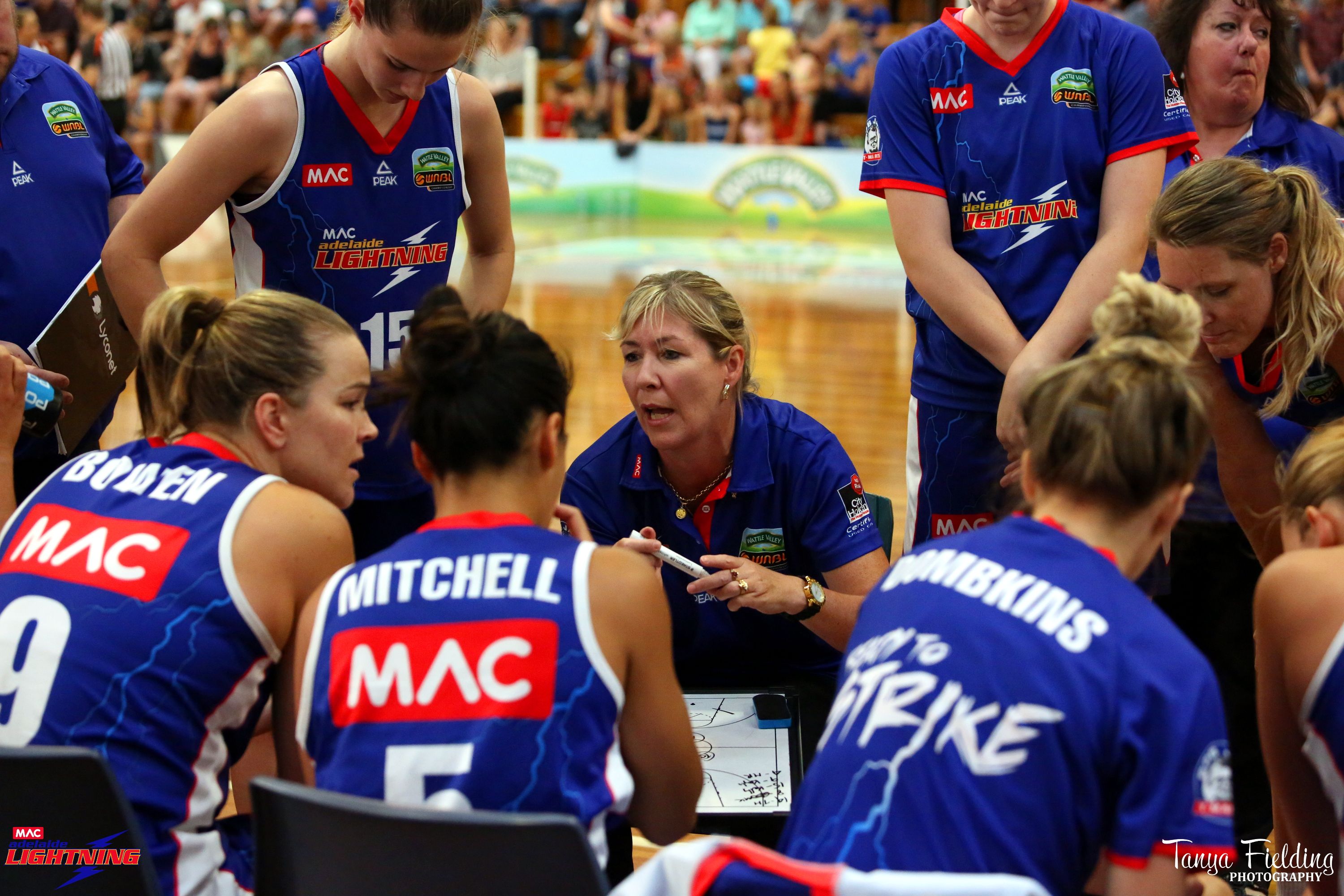 Elite Coaching and the Gender Performance Gap