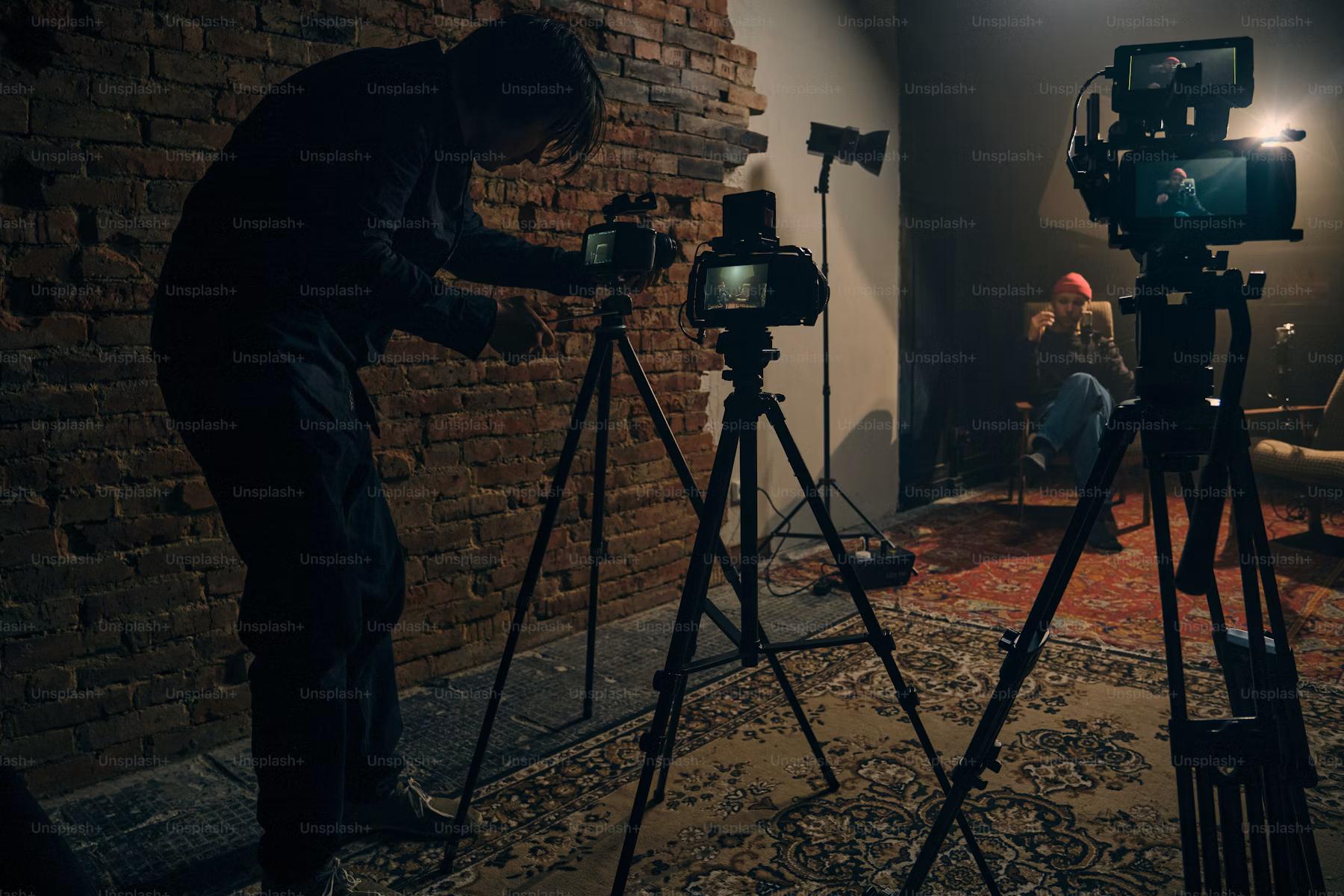 Camera and lighting equipment set up in an interior location