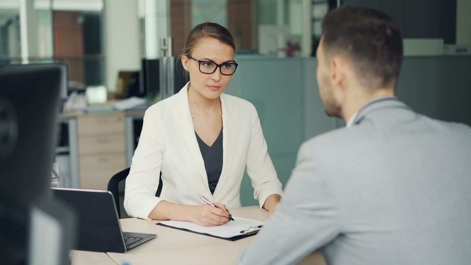 Office interview setup for a corporate video location decision