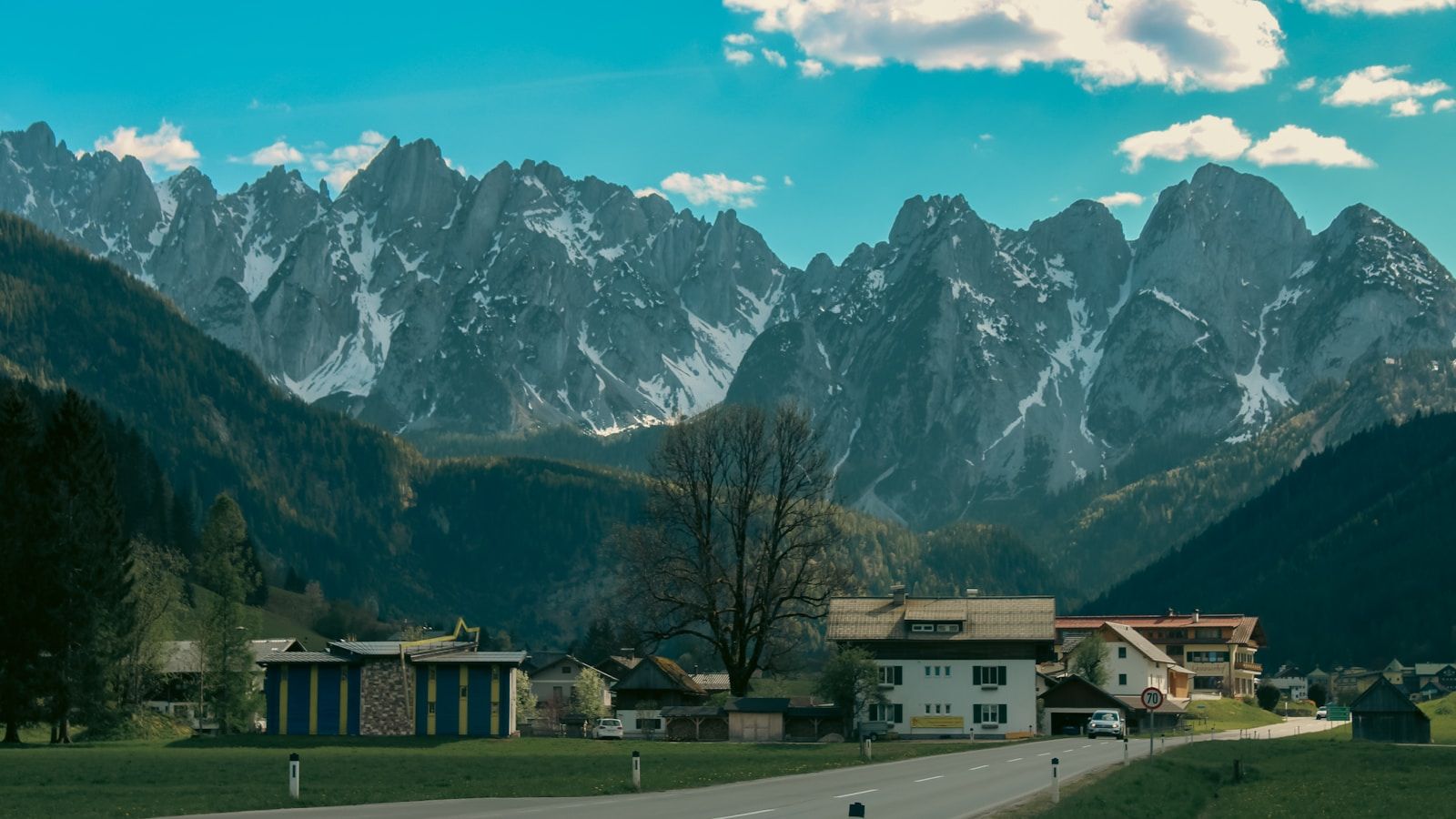 Alpine village and mountain valley as a reference for cross-border film location planning