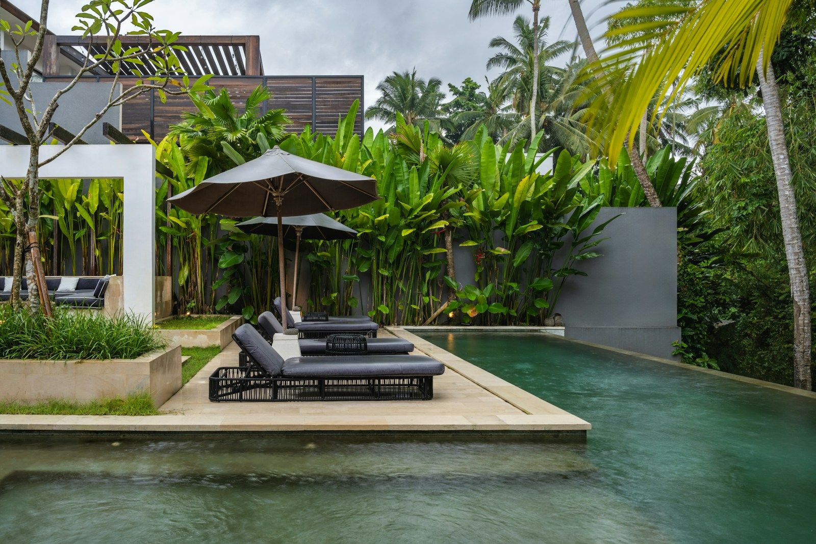 Private garden pool with lounge chairs as a reference for outdoor film and photo location listings