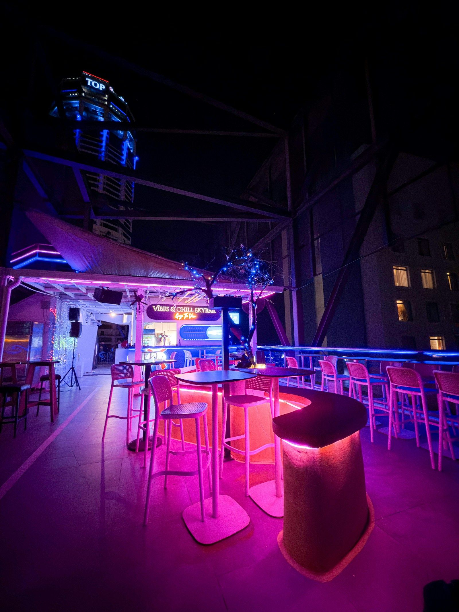 Neon-lit bar at night as a reference for bar, club and nightclub film locations