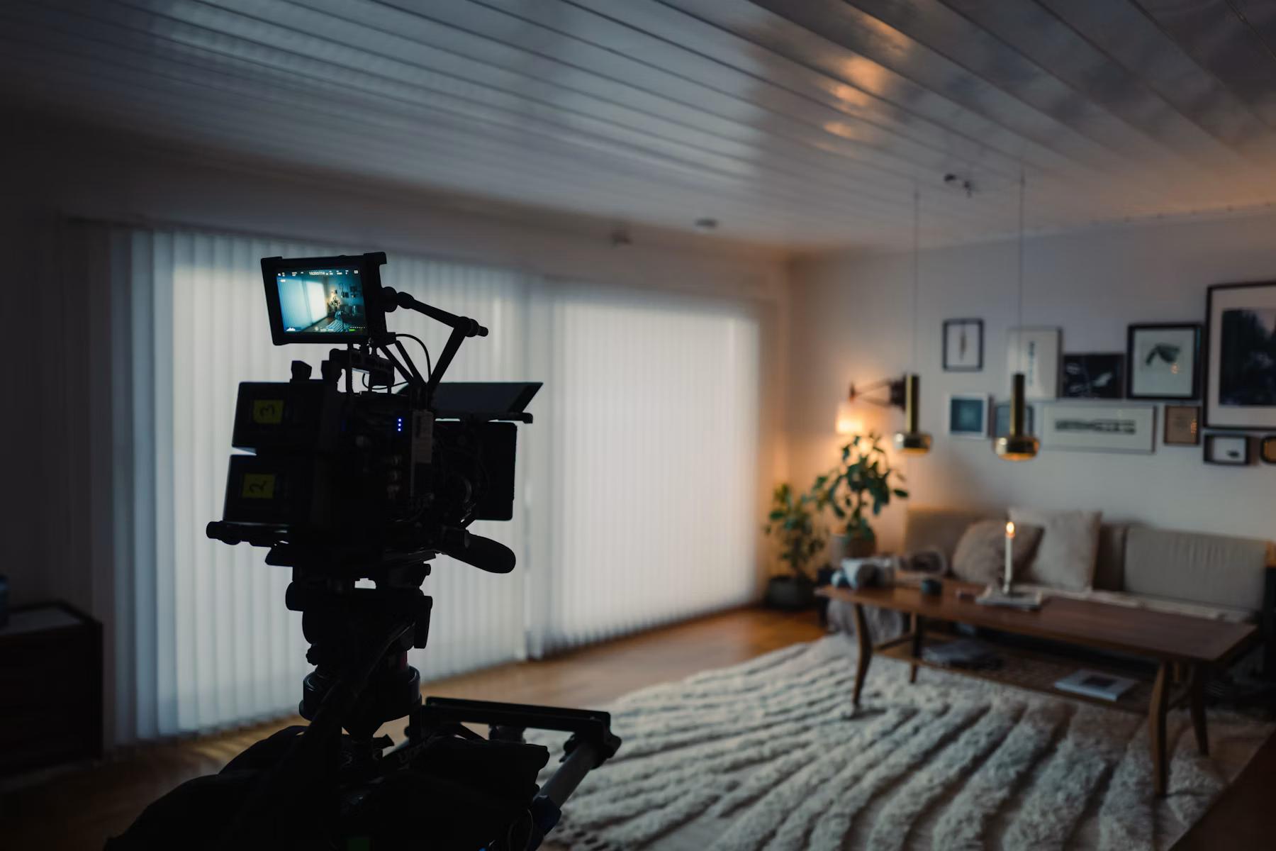 Camera on a tripod in a residential living room