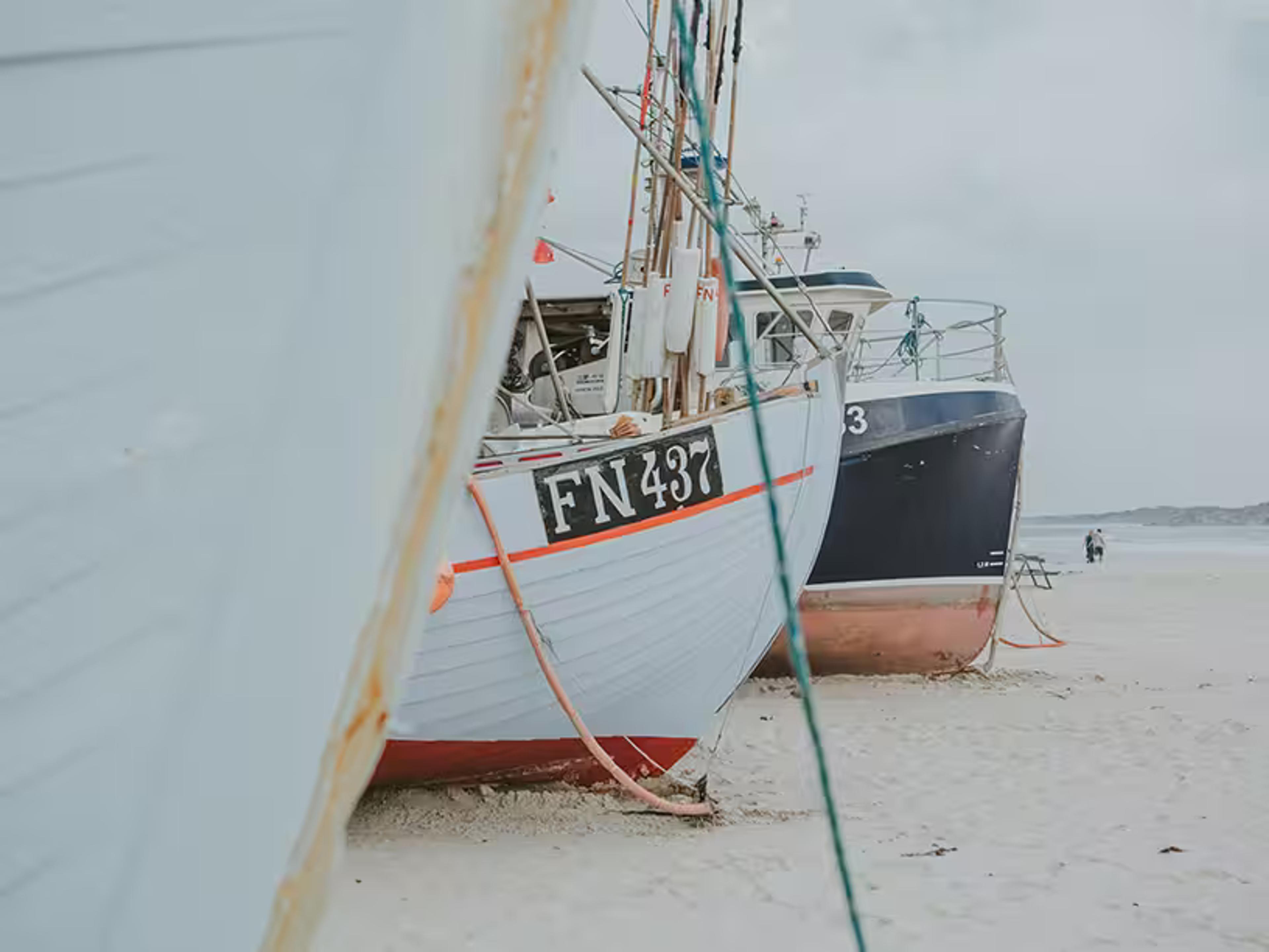 Billede af gamle fiskerbåde