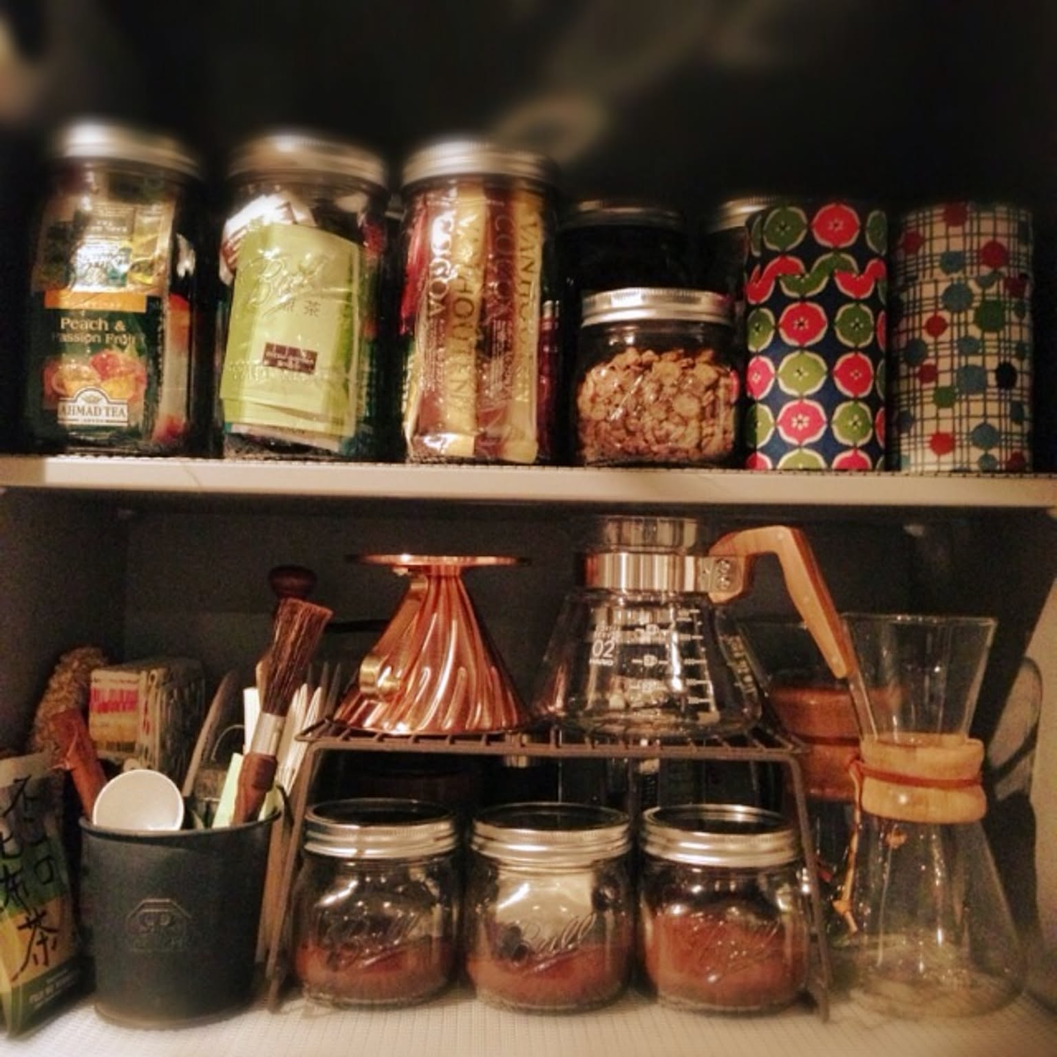HARIO V60 copper dripper and HARIO coffee server arranged on a compact coffee shelf