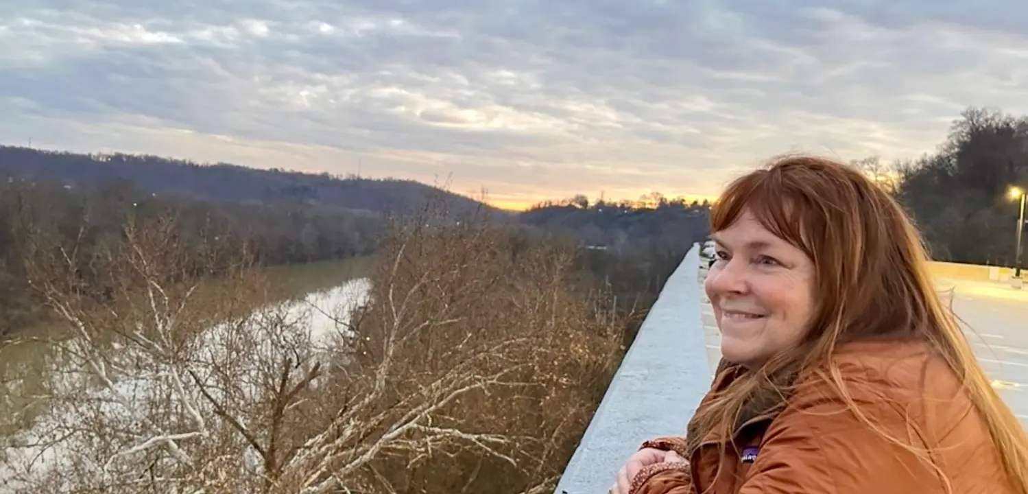 SaraDay overlooking the Kentucky River running through her beloved capital city, Frankfort, KY  Photo Credit: Amelia Baxter