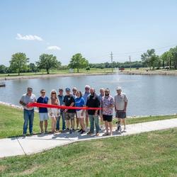The City of Neodesha, along with the Active Transportation Advisory Board and other community members, gathered at Riverwalk Park