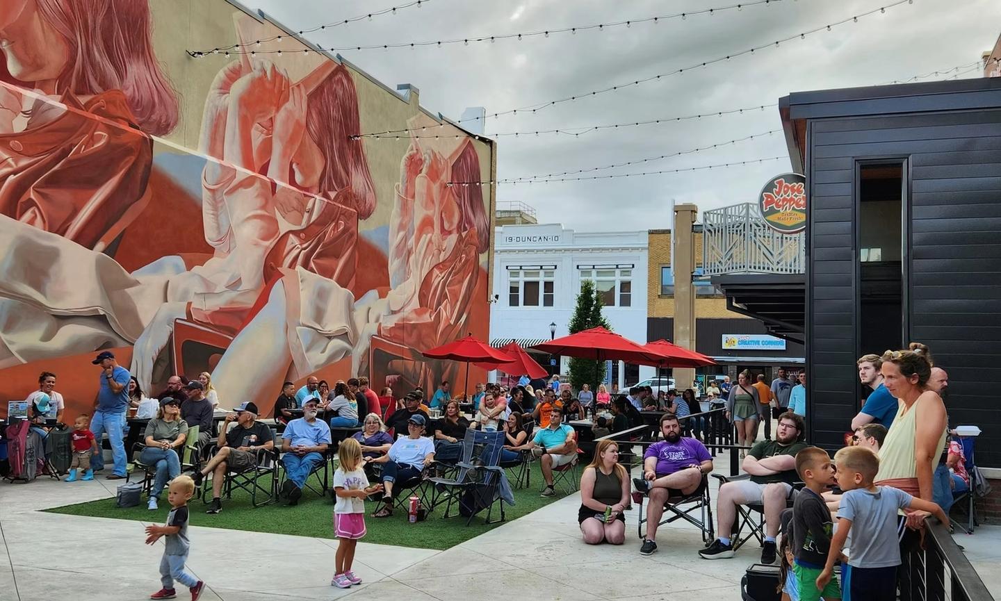Salina has become a premier public art destination. World-renowned artists turn downtown walls and grain silos into massive murals through the Salina Kanvas Project and BOOM! Salina Street Art & Mural Festival. (Photo credit: Salina Downtown, Inc.)