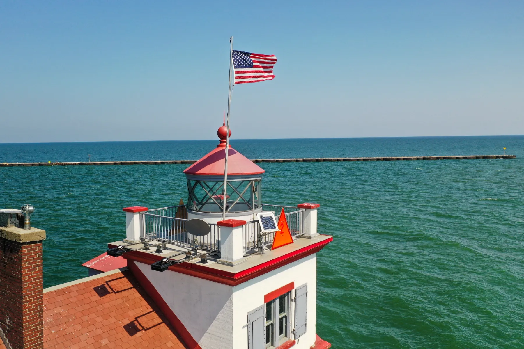 Known as “The Jewel of the Port,” the historic Lorain Lighthouse is open for sightseeing, tours, and special events. Photo credit: Lake Front Drones / Shutterstock.com