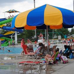 People enjoying the Portland, IN Waterpark on a warm summer day