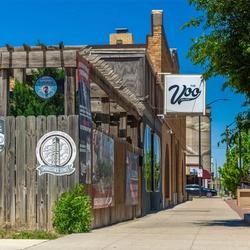 Meet up with friends at The Voo, a laid-back downtown spot for drinks, food, and live entertainment. (Image Credit: Discover Salina)