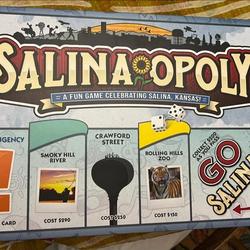 Start exploring your new community with Salina-Opoly, a custom board game featuring Salina landmarks, attractions, and local businesses – all included in your Welcome Wagon. (Image Credit: Pronto Printers on Facebook)