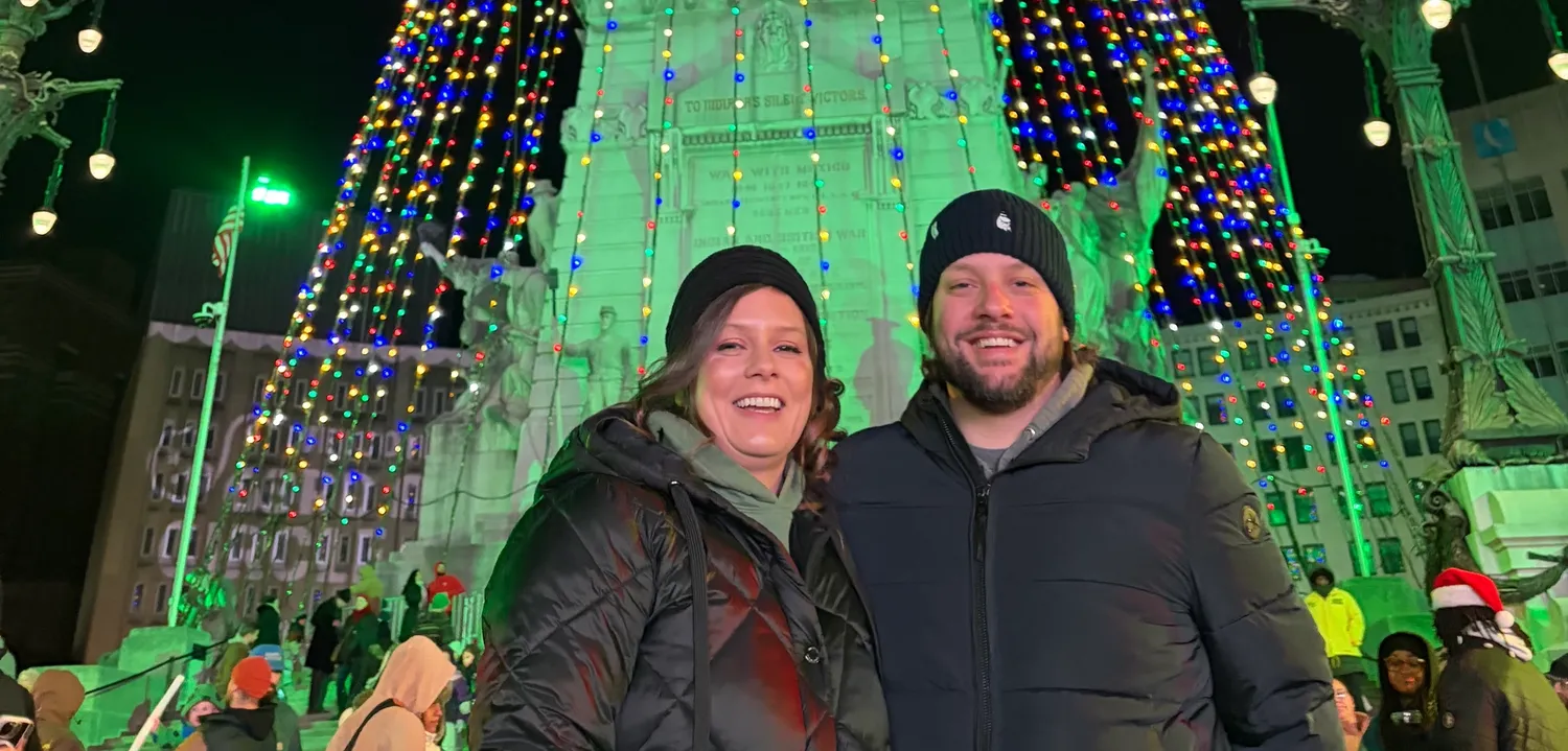 Karla and her brother enjoy Christmas on Monument Circle after spending a decade apart.