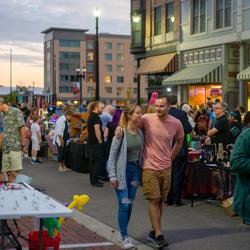 Lively festival on a summer evening in Downtown Muncie. (Image credit: DWNTWN Muncie)