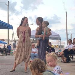 Kids play at Rock the River Music Festival in Downtown Marion