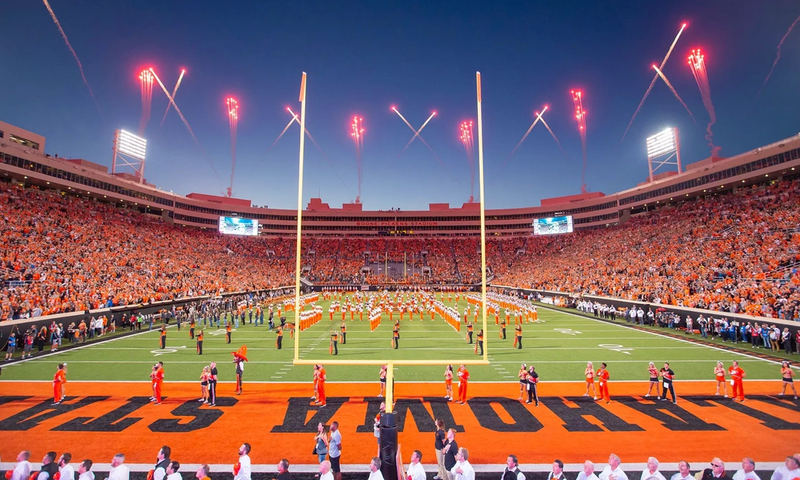 Oklahoma State University's football stadium full of people wearing orange