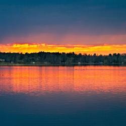 Red sunset over lake in Bemidji, Minnesota