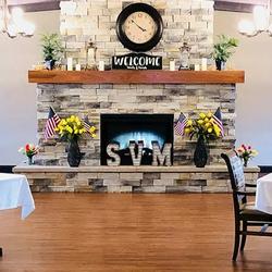 Dining room fireplace at Spring Valley Meadows.