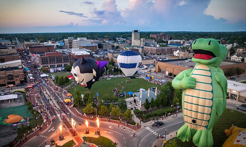 Fire Up DWNTWN is a street festival featuring hot air balloons, spicy foods, smokin’ ribs, and heart-pounding simulators. (Photo Credit: DWNTWN Muncie)