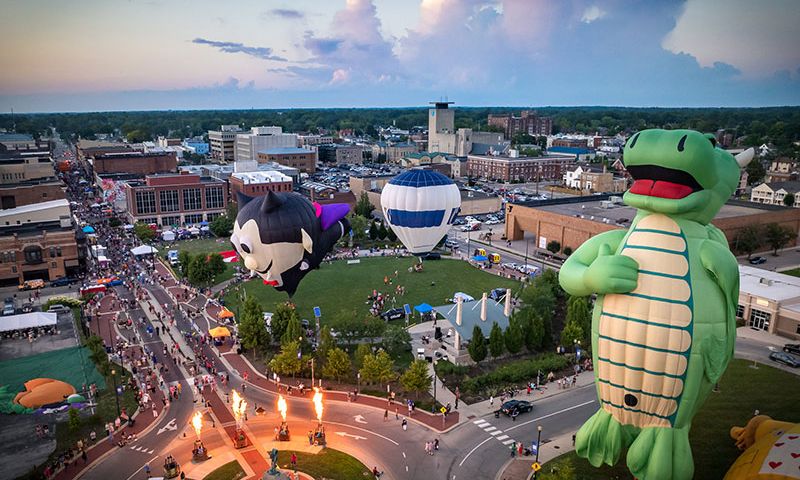 Fire Up DWNTWN is a street festival featuring hot air balloons, spicy foods, smokin’ ribs, and heart-pounding simulators. (Photo Credit: DWNTWN Muncie)