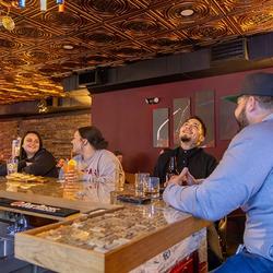 Enjoy an evening out at The Cellar, where craft cocktails, wine, and whiskey are served in a cozy downtown setting. (Image Credit: Discover Salina)