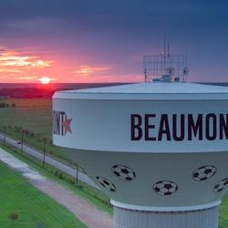 Water tower at sunset in Beaumont, Texas.