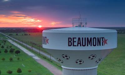 Water tower at sunset in Beaumont, Texas.