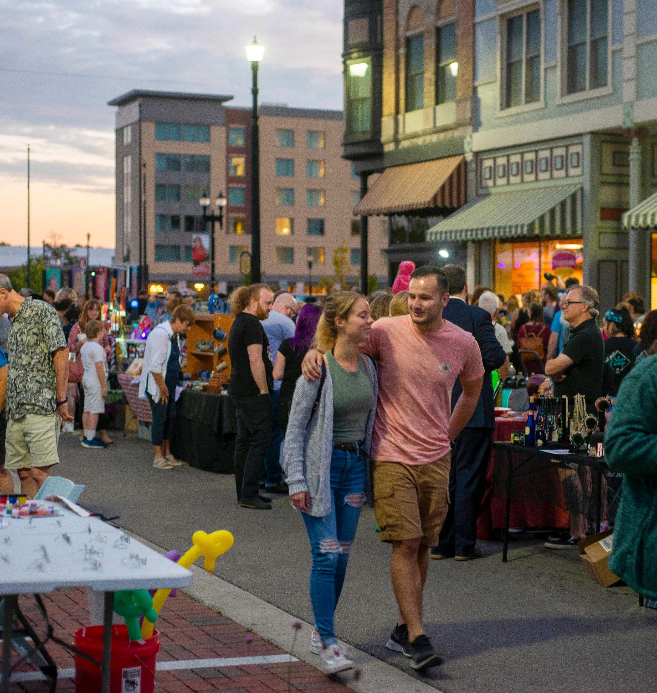 Lively festival on a summer evening in Downtown Muncie. (Image credit: DWNTWN Muncie)