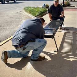 Members of the Public Works team began installation of new benches and trash cans