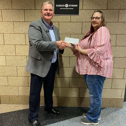 A mover receiving her relocation stipend for moving to Dubois County!