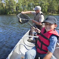 Father and son fish on Minnesotan lake
