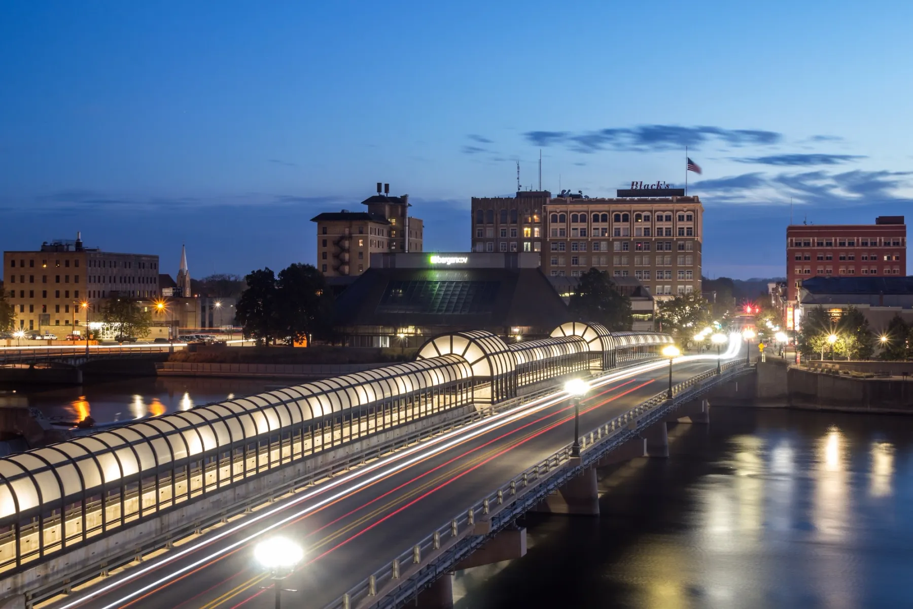 Illuminated Pedestrian Walkway on the W 4th Street Bridge over the Cedar River in Downtown Waterloo, Iowa. Photo credit: Sam Wagner / Shutterstock.com