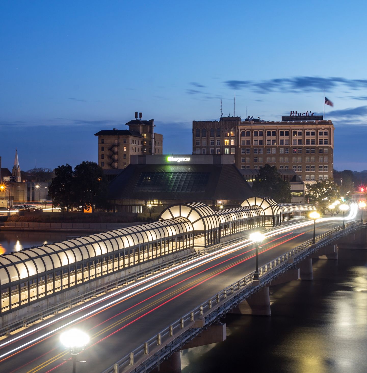 Illuminated Pedestrian Walkway on the W 4th Street Bridge over the Cedar River in Downtown Waterloo, Iowa. Photo credit: Sam Wagner / Shutterstock.com