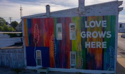 The Love Grows Here mural in Greensburg