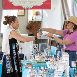 At the Smoky Hill River Festival, browse hundreds of artists showcasing handmade work–it's one of the Midwest's premier art festivals! (Image Credit: Smoky Hill River Festival)