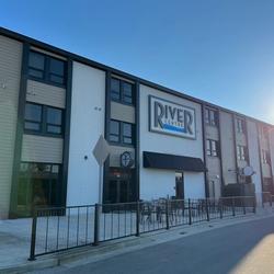 River Centre in Jasper, Indiana, sits right along the river walk and features restaurants and newly opened apartments.