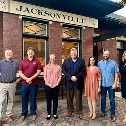 Successful applicants to the first round of the Jacksonville Region’s MakeMyMove program gathered at Jacksonville Regional Economic Development Corporation’s Investor Appreciation Event. Pictured left to right: Lance, Cade, Emma, Jacksonville Mayor Andy Ezard, Elena, Nathan and JREDC President Kristin Jamison.