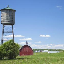 Water tower and red barn near Manilla, Iowa