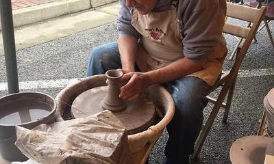 Local resident using a pottery wheel