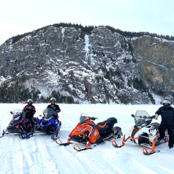 Snowmobiling in Northern Maine (Credit: Live + Work in Maine)