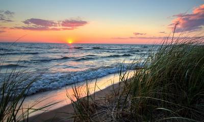 Hoffmaster State Park, featuring sandy beaches and dunes, is one of many outdoor recreational areas in Muskegon.  