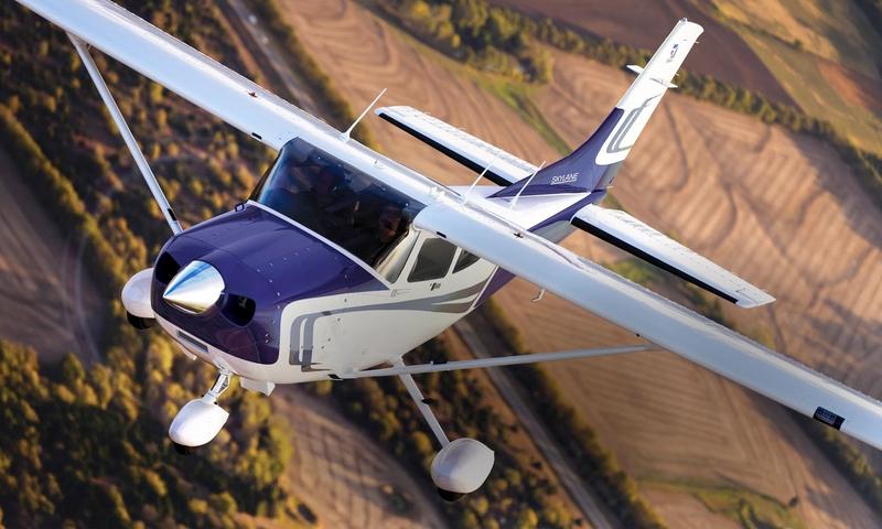 Cessna plane over Kingman