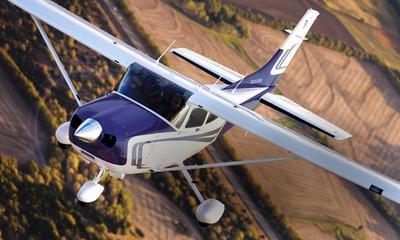 Cessna plane over Kingman