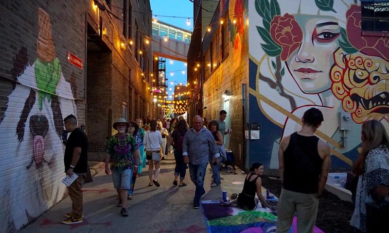 The Art This Way Art Crawl: Alley Bash is an annual fundraising event that celebrates public art,, murals, and local culture within the "Double Plus" alleyways. (Photo Credit: Visit Fort Wayne)