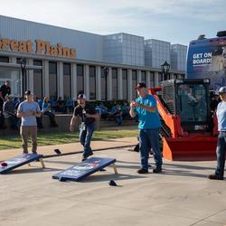 Employees gather outside Great Plains Manufacturing's Salina headquarters, where one of the region's largest employers builds equipment used by farmers around the world. (Image Credit: Great Plains Manufacturing)