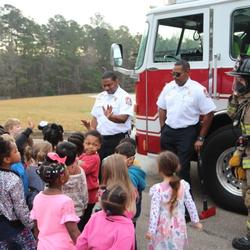 Local firefighters at a local school in Macon-Bibb (Credit: Choose Macon)