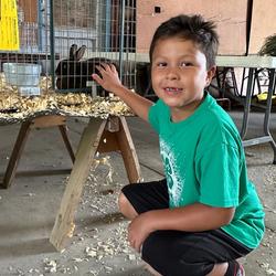 McPherson boy showing rabbit