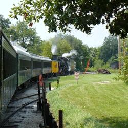 A moving train curves on a track in Britt, Iowa