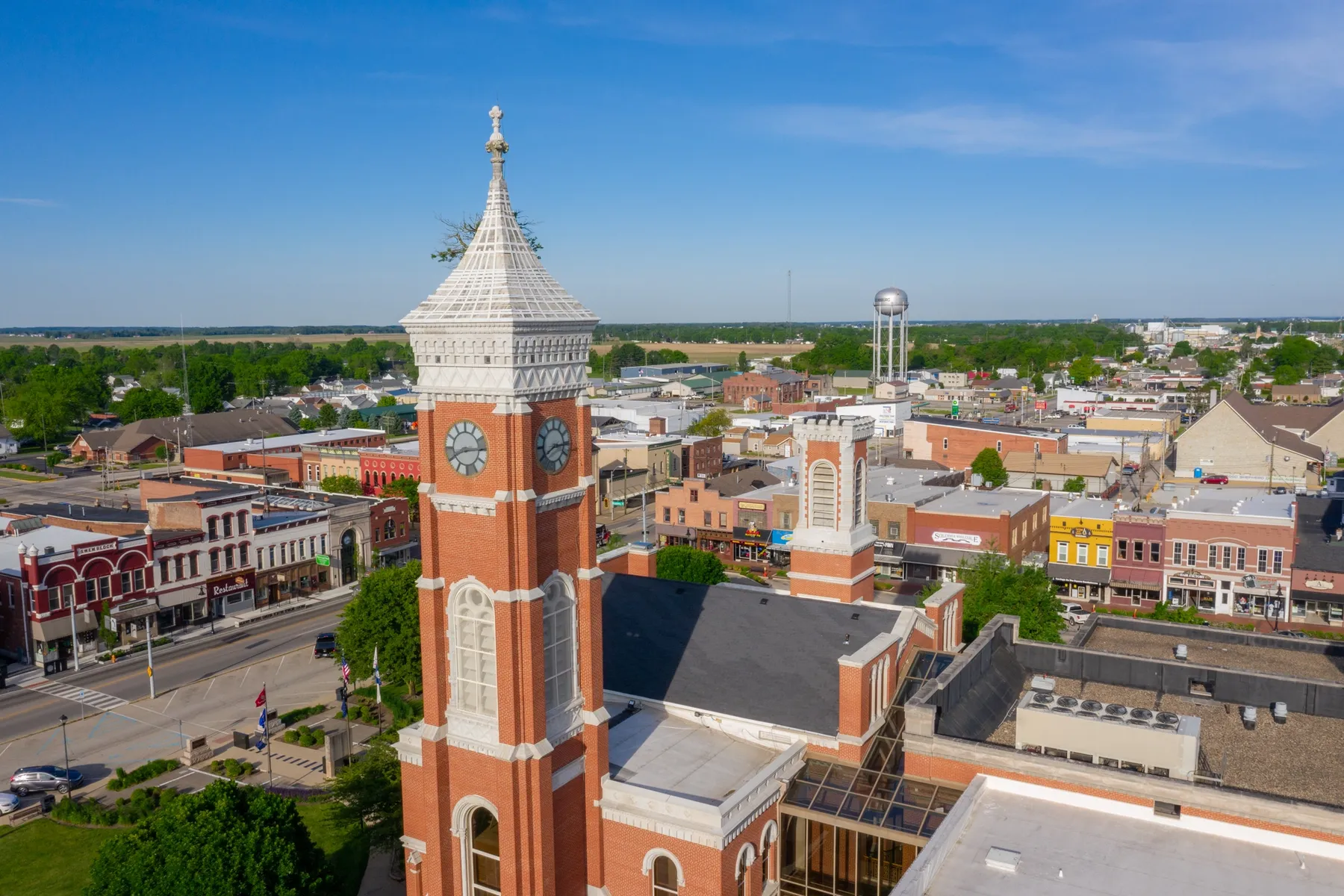 An aerial shot of downtown Greensburg with the famous tree tower in the foreground