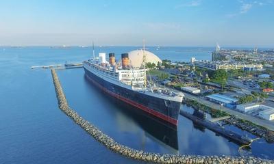 The RMS Queen Mary,a retired British ocean liner, now serves as a popular tourist destination with a hotel, shops, and restaurants.